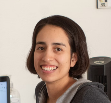 Woman at desk smiling